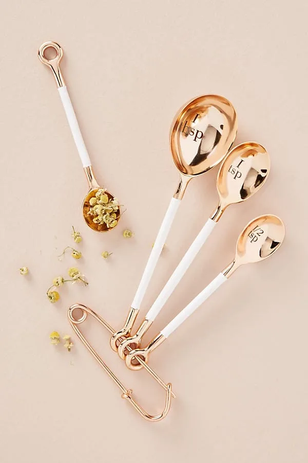 Gold measuring spoons