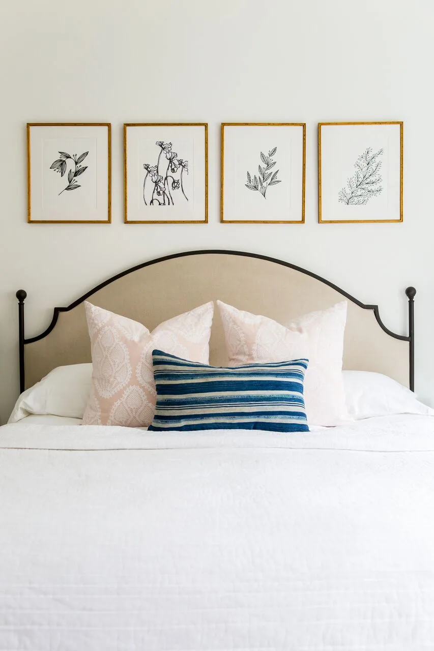 How to Decorate Above A Bed - Row of Frames